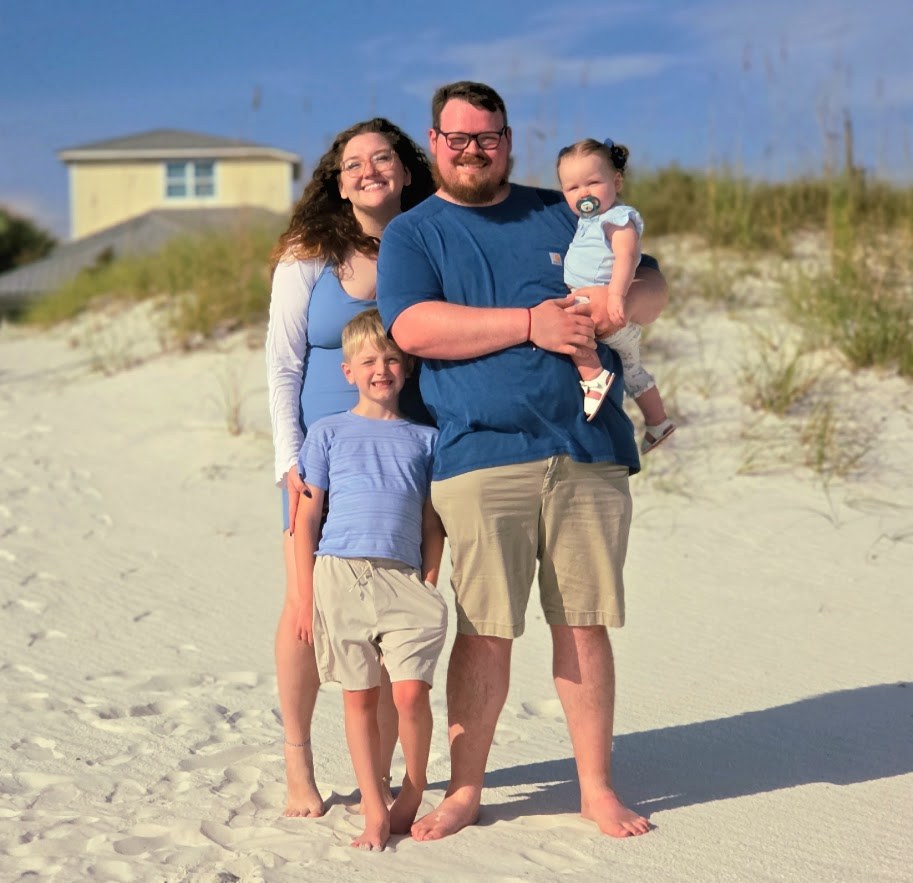 Family photo taken at the beach